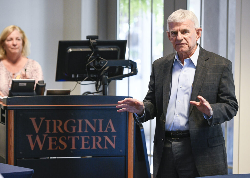 President of Virginia Western Community College, Dr. Bobby Sandel, talks at a lectern.