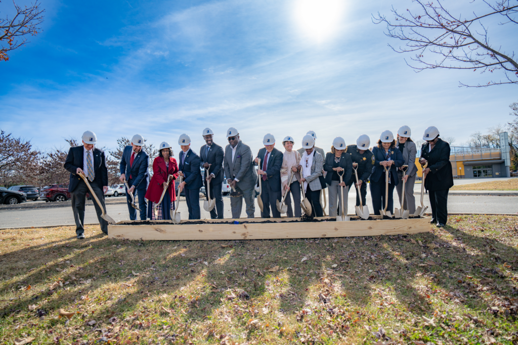 Group of people posing for a groundbreaking for the new Melrose Plaza in Roanoke, VA.